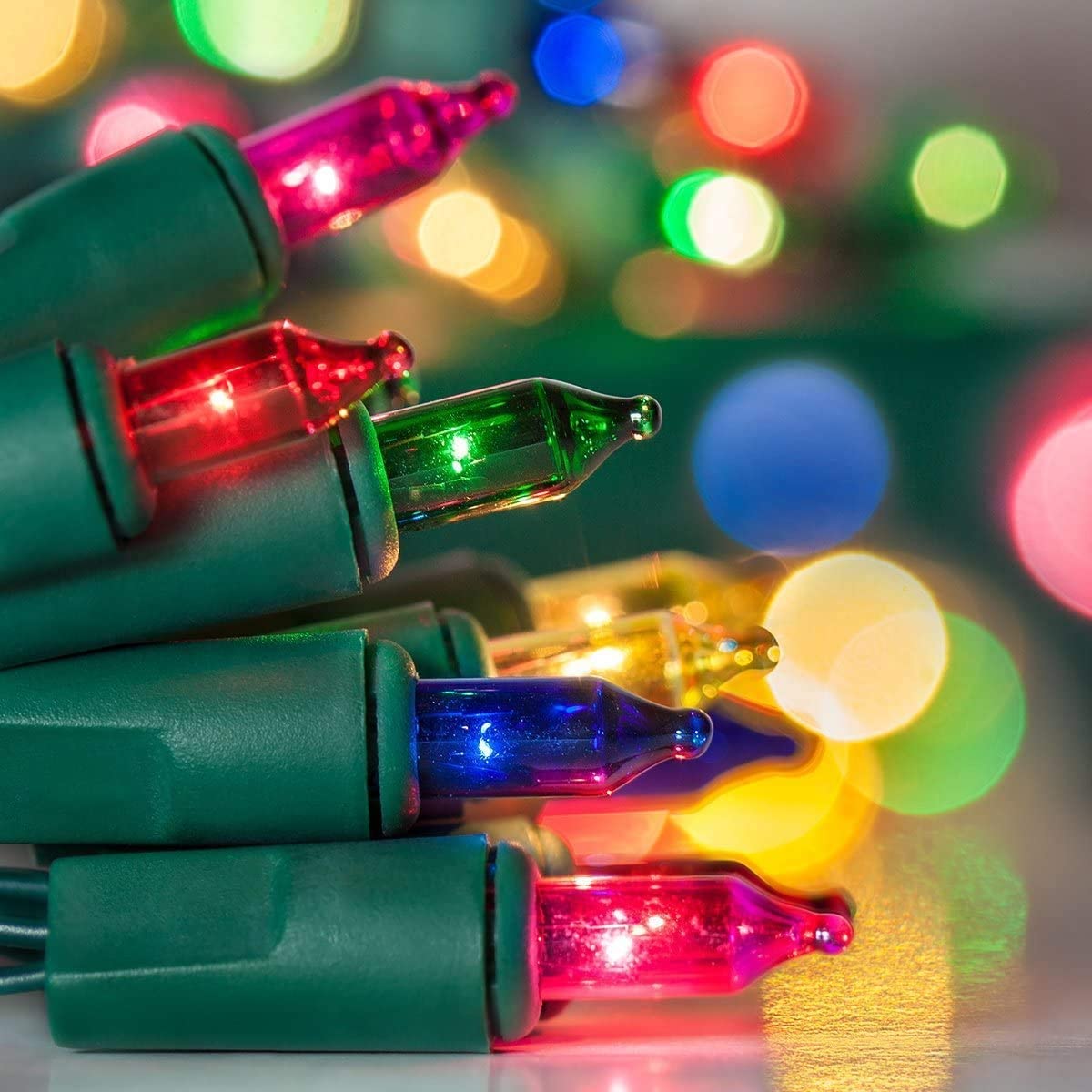100 Indoor/Outdoor Multi-Color Musical Christmas Lights - Plays 25 Classical Holiday Songs - 8 Function Chaser - Green Wire - 26 Ft Wire Length, 2" Space Between Bulbs